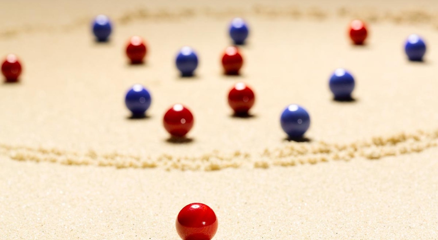 close up of red and blue marbles