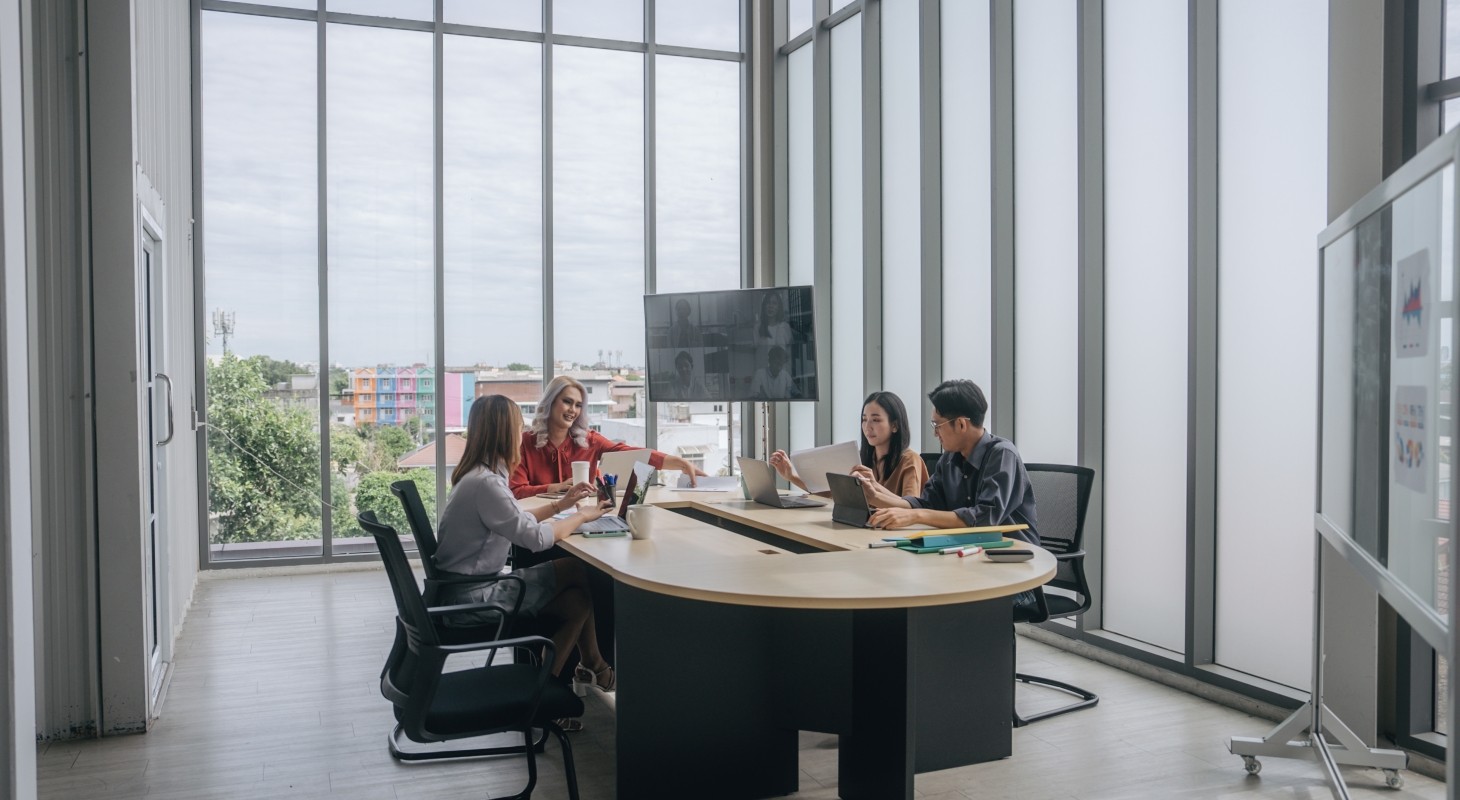 business team having meeting in bright modern conference room