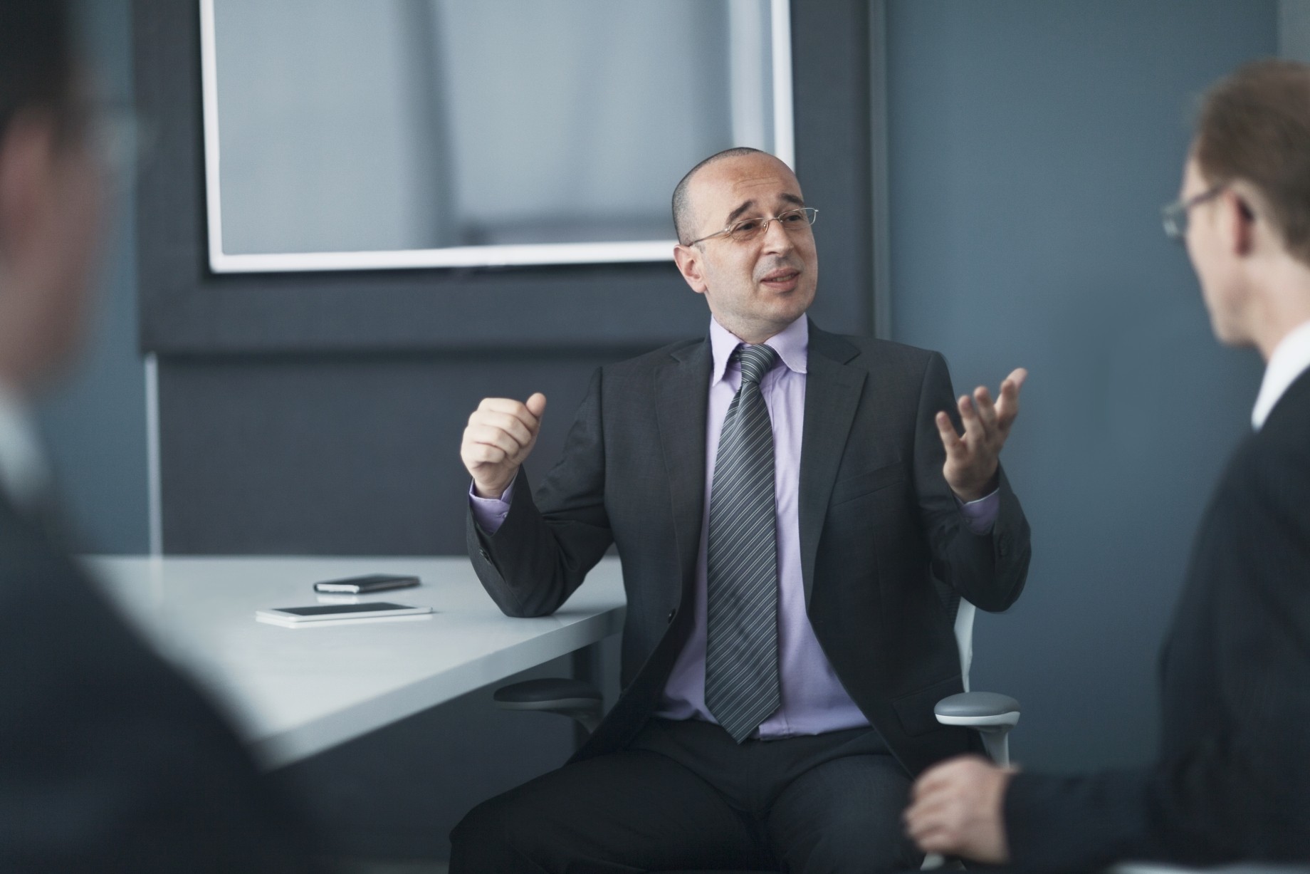 businessman explaining concepts in meeting